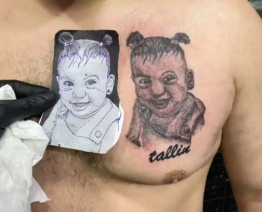 Tatuagem de bebê demônio.