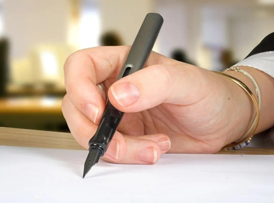 Caneta Escrevendo